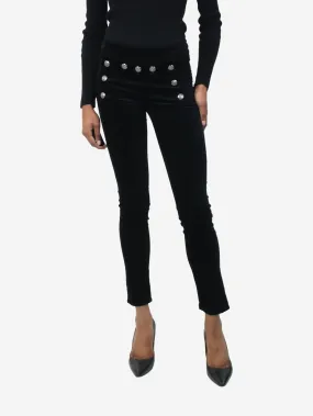 Black velvet trousers with button detail - size W 26